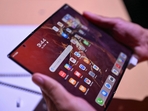 Samsung is expected to unveil its first tri-fold smartphone, which could be called the Galaxy G Fold. (Representative image)(AFP) Samsung is expected to unveil its first tri-fold smartphone, which could be called the Galaxy G Fold. (Representative image)(AFP)