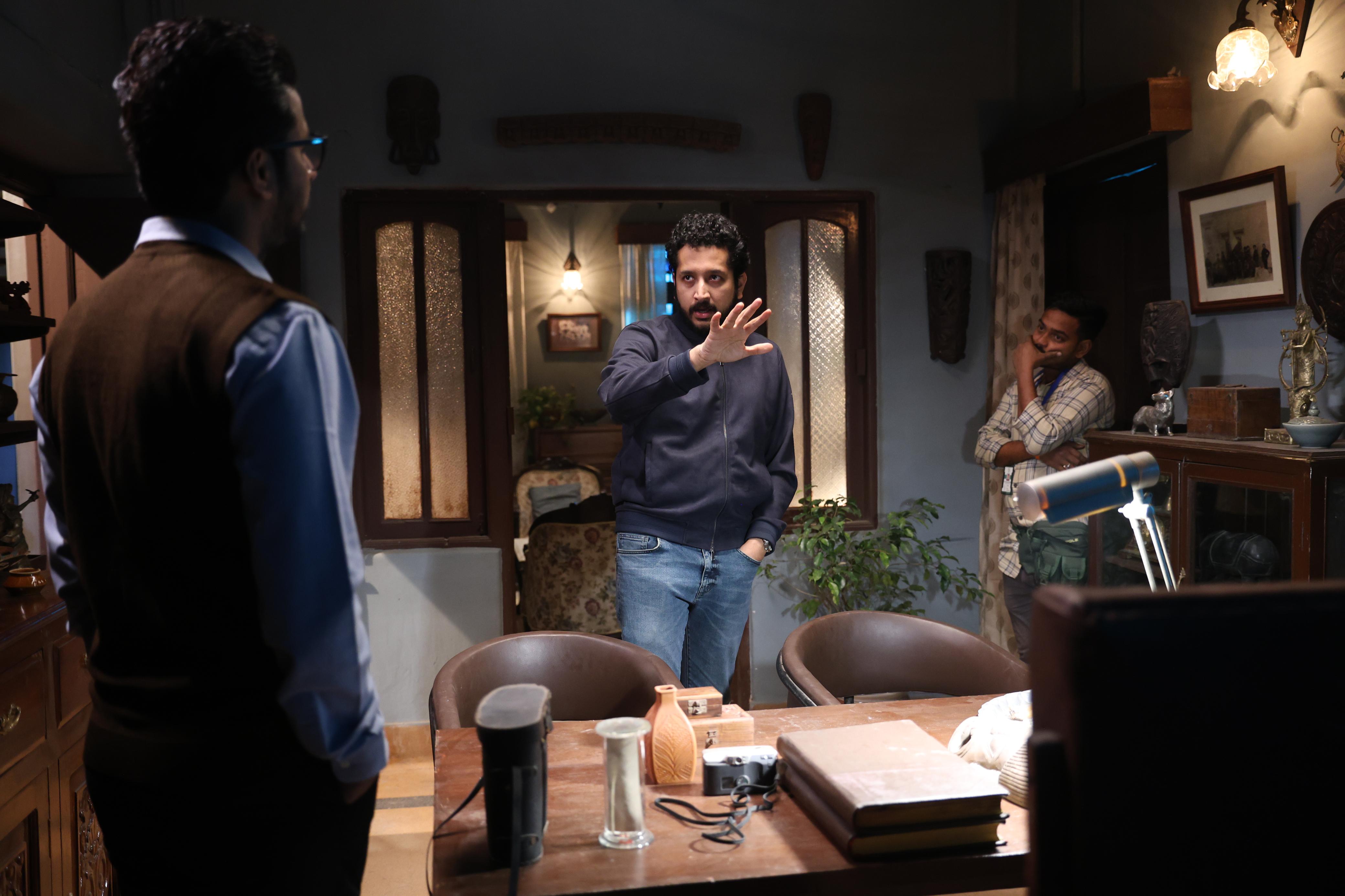Director Parambrata Chatterjee demonstrating a scene on the set of Bhog. Director Parambrata Chatterjee demonstrating a scene on the set of Bhog.