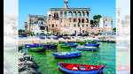Skip the obvious Italian sights for Polignano a Mare, where cream houses merge into the sea. (ADOBE STOCK) Skip the obvious Italian sights for Polignano a Mare, where cream houses merge into the sea. (ADOBE STOCK)