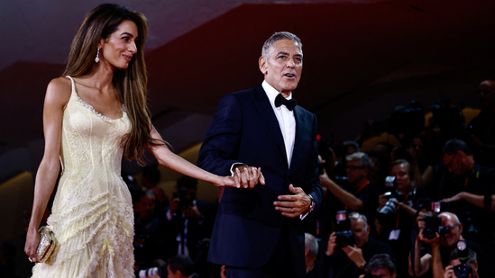 eorge and Amal Clooney's marriage faces challenges as Amal considers moving back to Europe. George's recent political controversies and Broadway debut have added strain.(REUTERS)