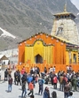 People gather at Kedarnath Dham after the portals were opened to devotees on Friday. (HT Photo) People gather at Kedarnath Dham after the portals were opened to devotees on Friday. (HT Photo)