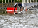 NDMC workers try to open the choked drains and clear a waterlogged stretch after rain and storm outside the Bharat Mandapam underpass, Pragati Maidan, in New Delhi, India, on Friday, May 2, 2025. (Photo by RAJ K RAJ / Hindustan Times) NDMC workers try to open the choked drains and clear a waterlogged stretch after rain and storm outside the Bharat Mandapam underpass, Pragati Maidan, in New Delhi, India, on Friday, May 2, 2025. (Photo by RAJ K RAJ / Hindustan Times)