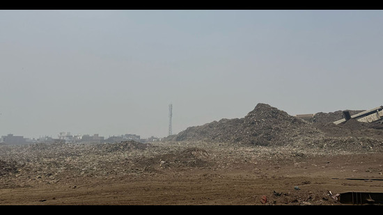 Garbage piled up at the dumping site on Tajpur Road in Ludhiana on Friday. (HT Photo) Garbage piled up at the dumping site on Tajpur Road in Ludhiana on Friday. (HT Photo)