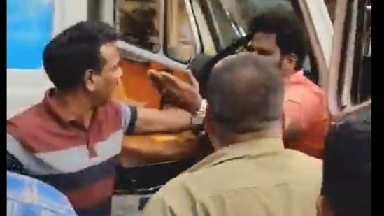 The ambulance driver was thrashed in Bengaluru after he rammed into multiple vehicles. (Screengrab from viral video. ) The ambulance driver was thrashed in Bengaluru after he rammed into multiple vehicles. (Screengrab from viral video. )