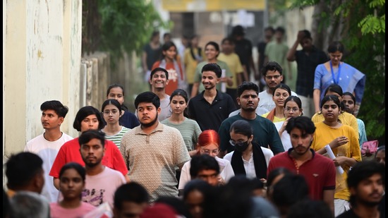 Candidates coming out of a centre in Lucknow on Sunday. (Deepak Gupta/HT photo) Candidates coming out of a centre in Lucknow on Sunday. (Deepak Gupta/HT photo)