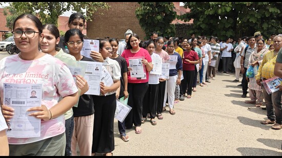 Candidates lining up at an exam centre to appear for the National Eligibility cum Entrance Test in Ludhiana on Sunday. (Gurpreet Singh/HT) Candidates lining up at an exam centre to appear for the National Eligibility cum Entrance Test in Ludhiana on Sunday. (Gurpreet Singh/HT)