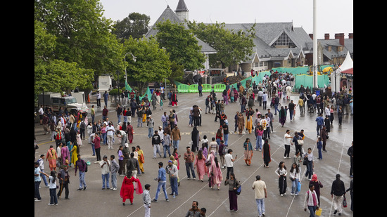 Tourists in large numbers on The Ridge in Shimla on Sunday. (PTI) Tourists in large numbers on The Ridge in Shimla on Sunday. (PTI)