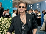 Shah Rukh Khan stunned at the Met Gala 2025, sporting a walking stick. Shah Rukh Khan stunned at the Met Gala 2025, sporting a walking stick.