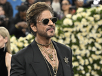 Bollywood superstar Shah Rukh Khan dazzled at the Met Gala on May 5, wearing a striking black suit by Sabyasachi. (Photo by Evan Agostini/Invision/AP)(Evan Agostini/Invision/AP) Bollywood superstar Shah Rukh Khan dazzled at the Met Gala on May 5, wearing a striking black suit by Sabyasachi. (Photo by Evan Agostini/Invision/AP)(Evan Agostini/Invision/AP)