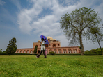 People enjoy the pleasant weather under the sky at Humayun's Tomb in New Delhi on Saturday. (RAJ K RAJ /HT PHOTO) People enjoy the pleasant weather under the sky at Humayun's Tomb in New Delhi on Saturday. (RAJ K RAJ /HT PHOTO)