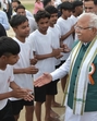 Union power minister and Karnal MP Manohar Lal Khattar meets players during a sports event in Panipat on Monday. (HT photo) Union power minister and Karnal MP Manohar Lal Khattar meets players during a sports event in Panipat on Monday. (HT photo)