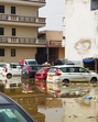 Vehicles parked in a waterlogged plot in Ashok Vihar in Gurugram. (HT PHOTO) Vehicles parked in a waterlogged plot in Ashok Vihar in Gurugram. (HT PHOTO)