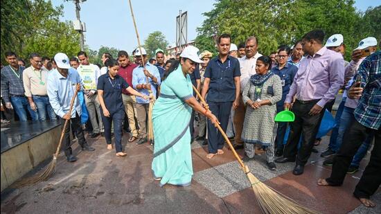 CM Rekha Gupta takes part in a cleanliness drive at Hanuman Temple, Connaught Place, on Tuesday. (Sanchit Khanna/HT PHOTO) CM Rekha Gupta takes part in a cleanliness drive at Hanuman Temple, Connaught Place, on Tuesday. (Sanchit Khanna/HT PHOTO)