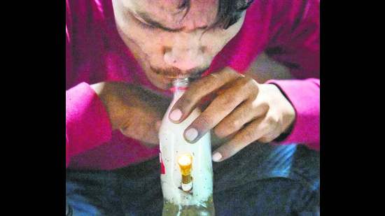 Youths ever since prohibition was enforced in Bihar have taken to drugs. Here a youth takes a Ganja shot through Gogo, a practice of putting frugs in bottle. (Santosh Kumar/HT) Youths ever since prohibition was enforced in Bihar have taken to drugs. Here a youth takes a Ganja shot through Gogo, a practice of putting frugs in bottle. (Santosh Kumar/HT)