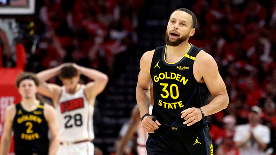 Golden State Warriors guard Stephen Curry (30) reacts after scoring a basket during the second half of game seven of the first round for the 2025 NBA Playoffs against the Houston Rockets at Toyota Center. Mandatory Credit: Troy Taormina-Imagn